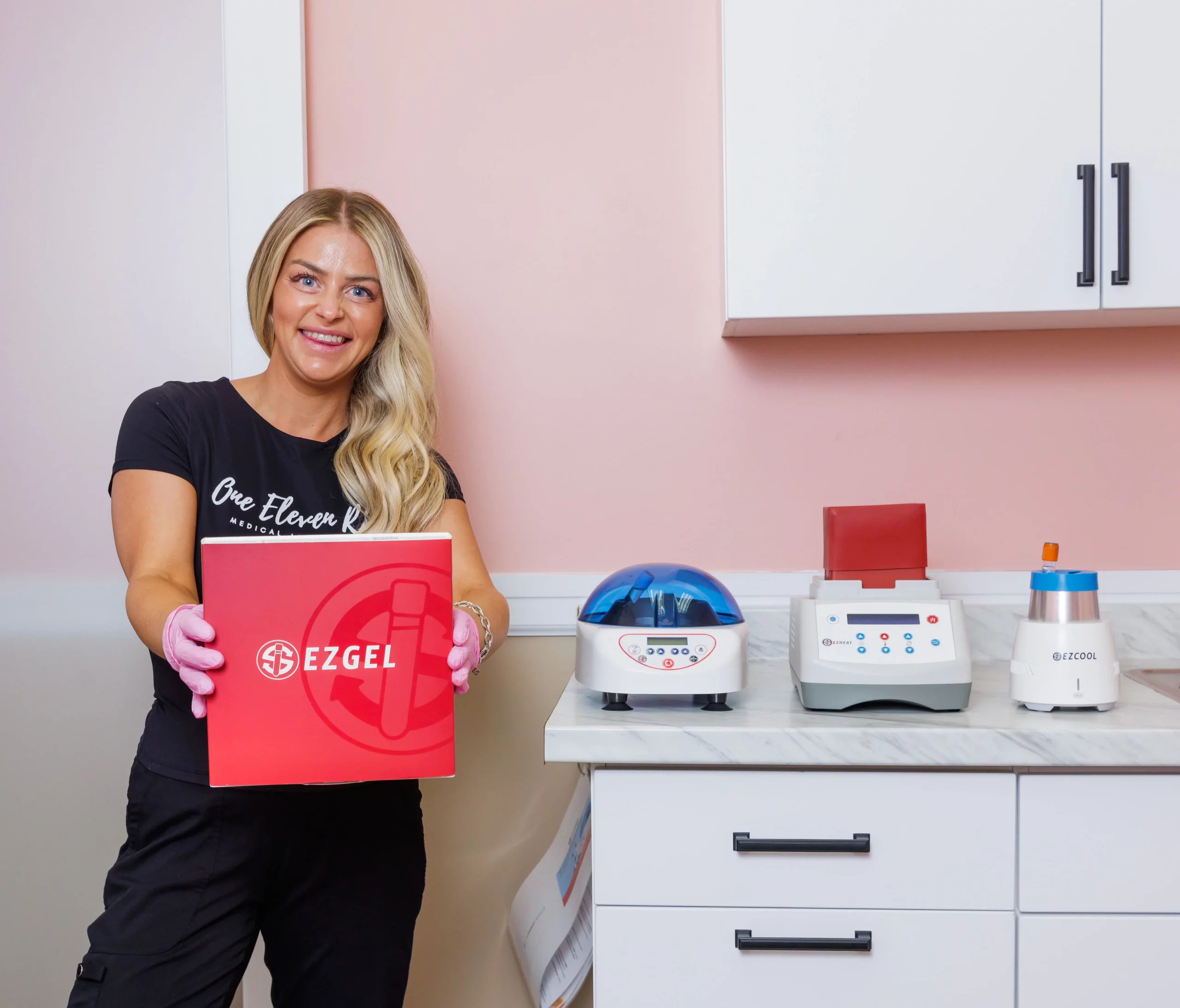 Clinician holding EZGEL box in medspa room | One Eleven RX