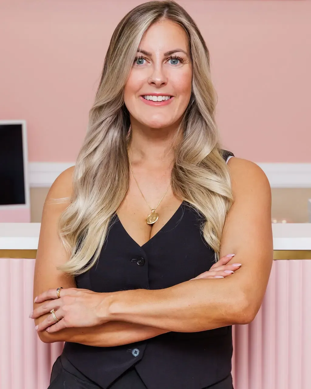 Staff member posing at One Eleven RX in Auburn, MA.