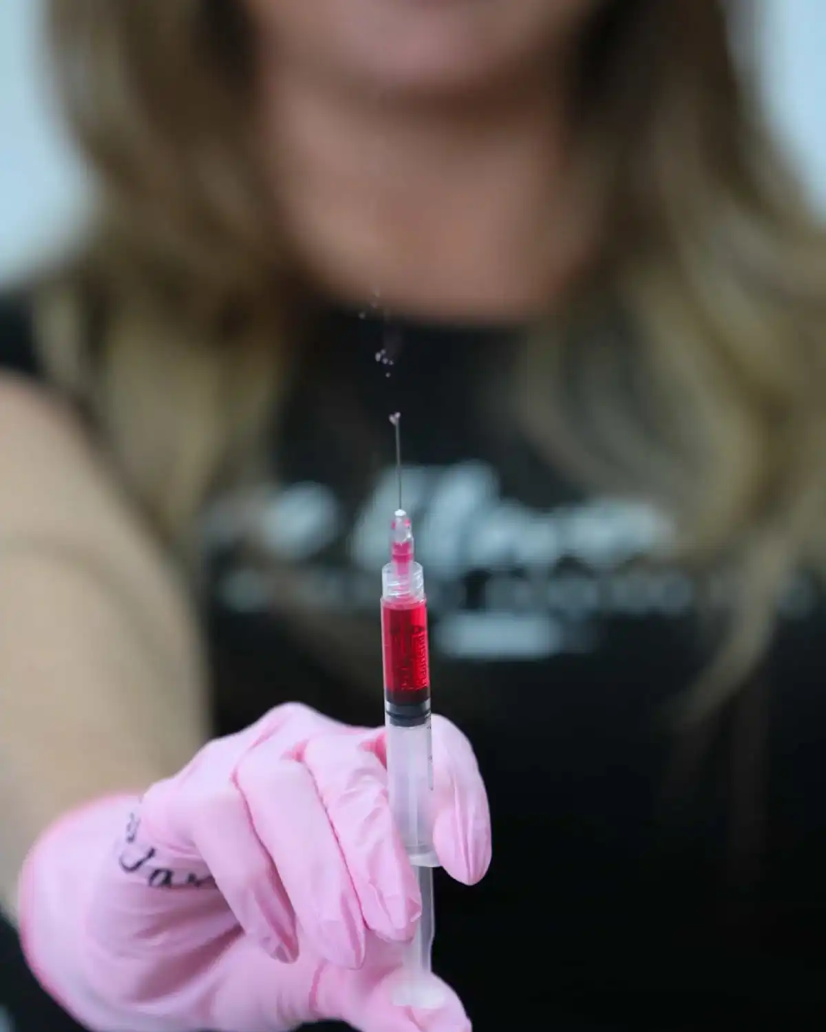 Nurse preparing PRP syringe for skin rejuvenation at One Eleven RX, Auburn, MA