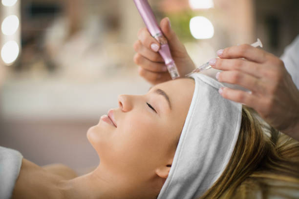 Client reviewing treatment plan during a calm medical spa consultation in Chicopee